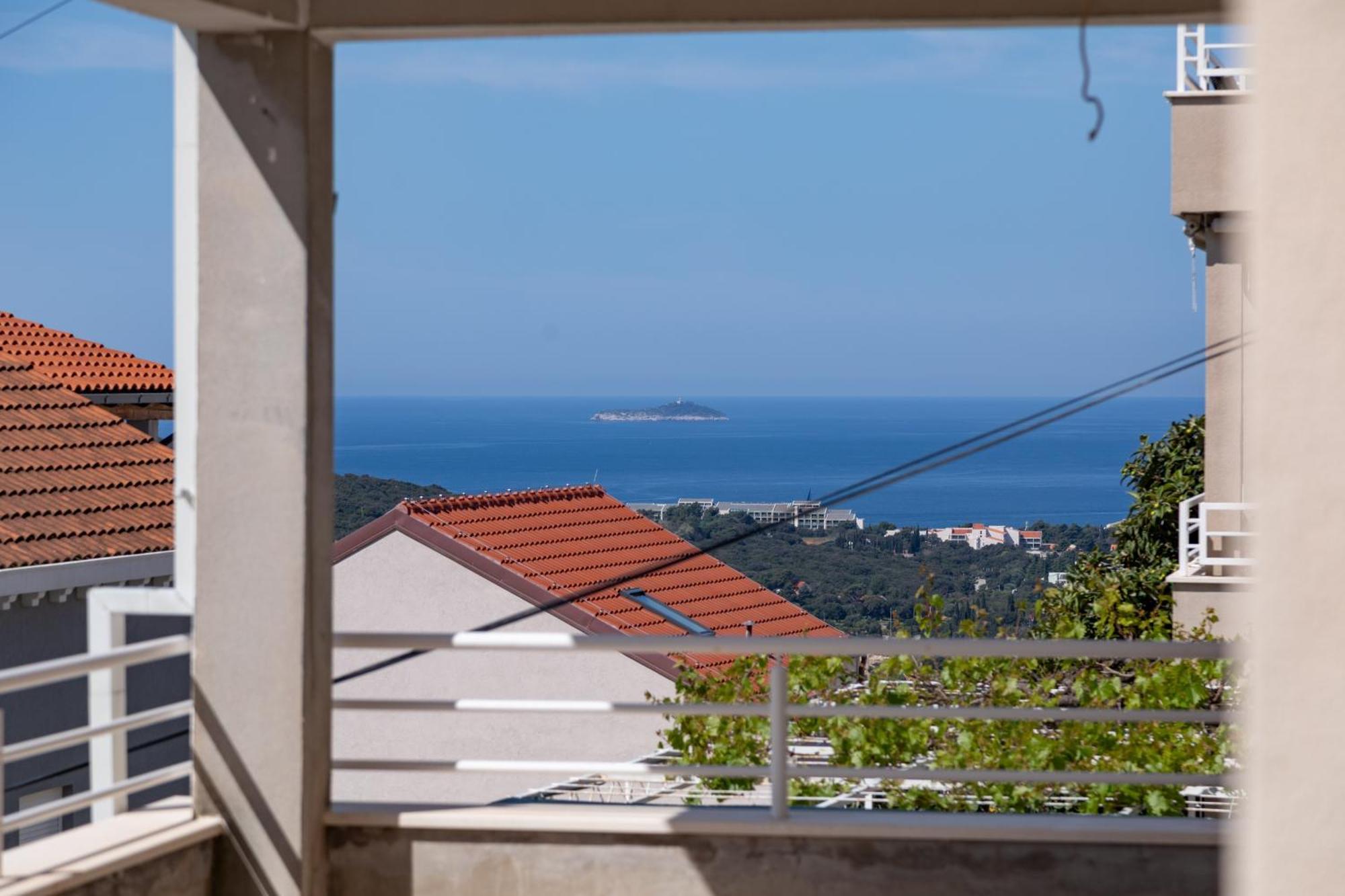 Three-Bedroom Apartment Balcony Partial Sea View
