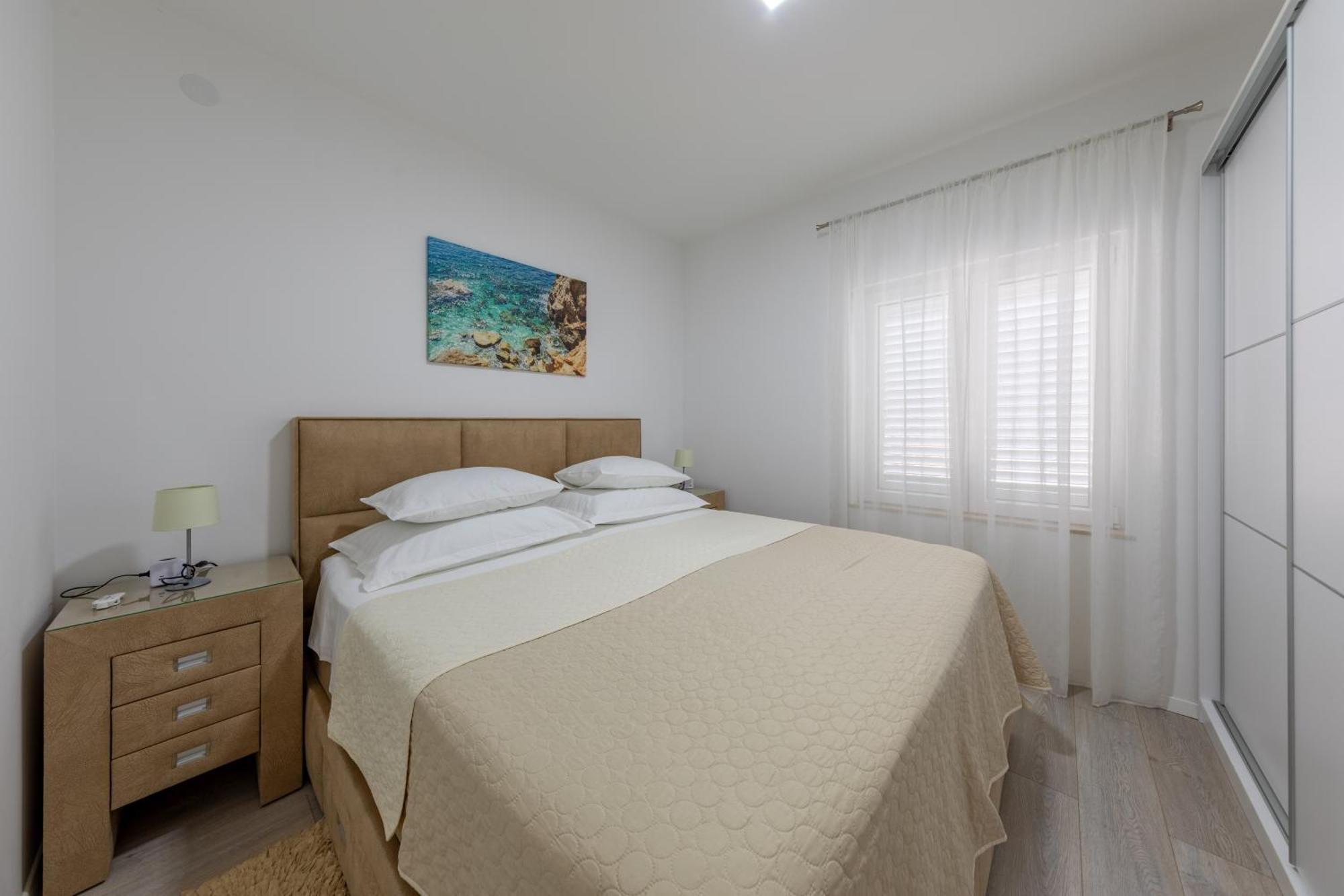 Three-Bedroom Apartment Balcony Partial Sea View