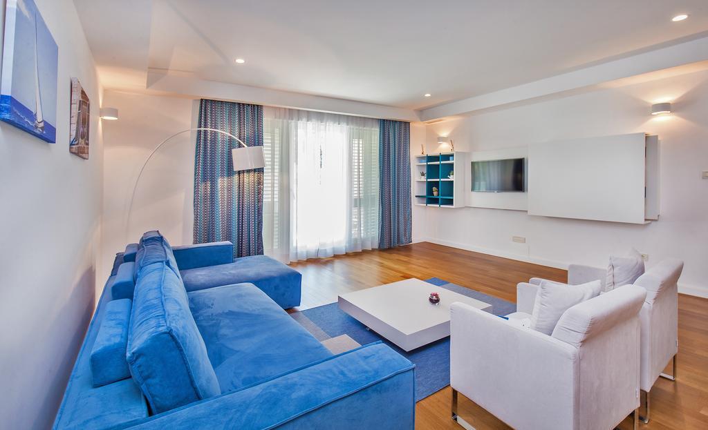 Deluxe Three-Bedroom Apartment Terrace Partial Sea View