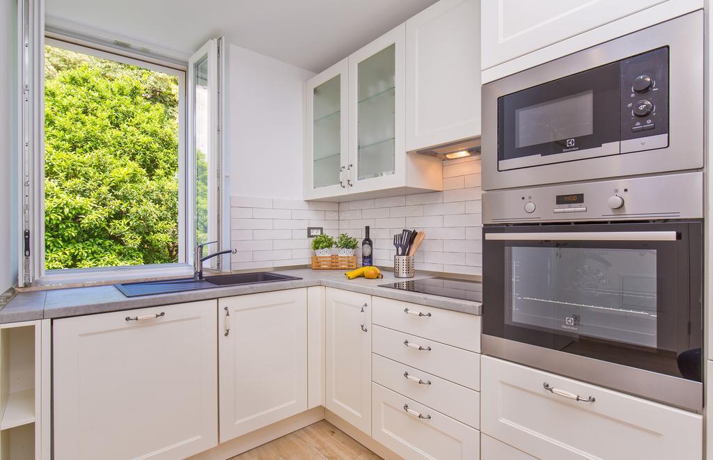 Deluxe One-Bedroom Apartment Između vrta 5