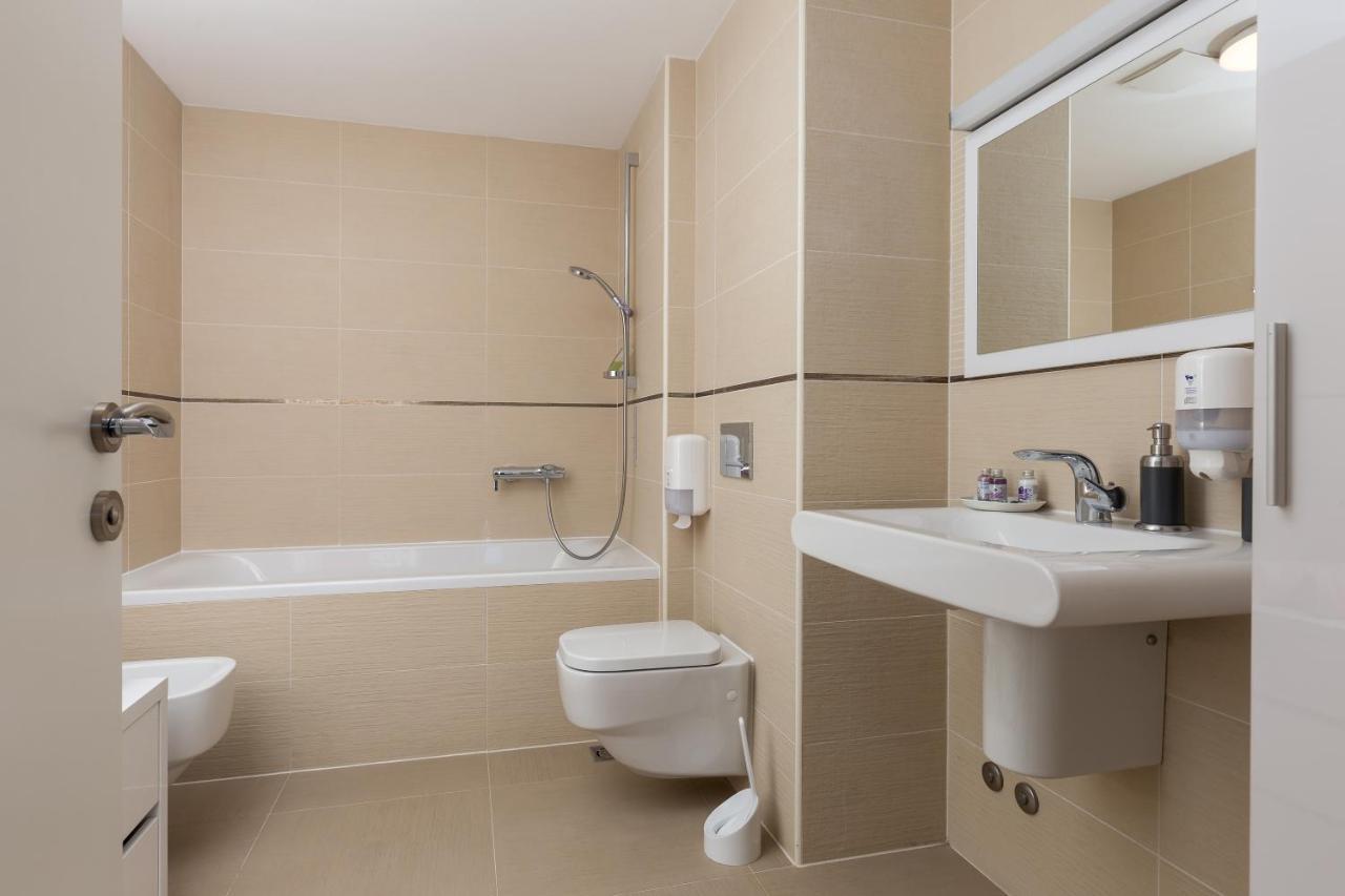 Comfort One-Bedroom Apartment Balcony Partial Sea View
