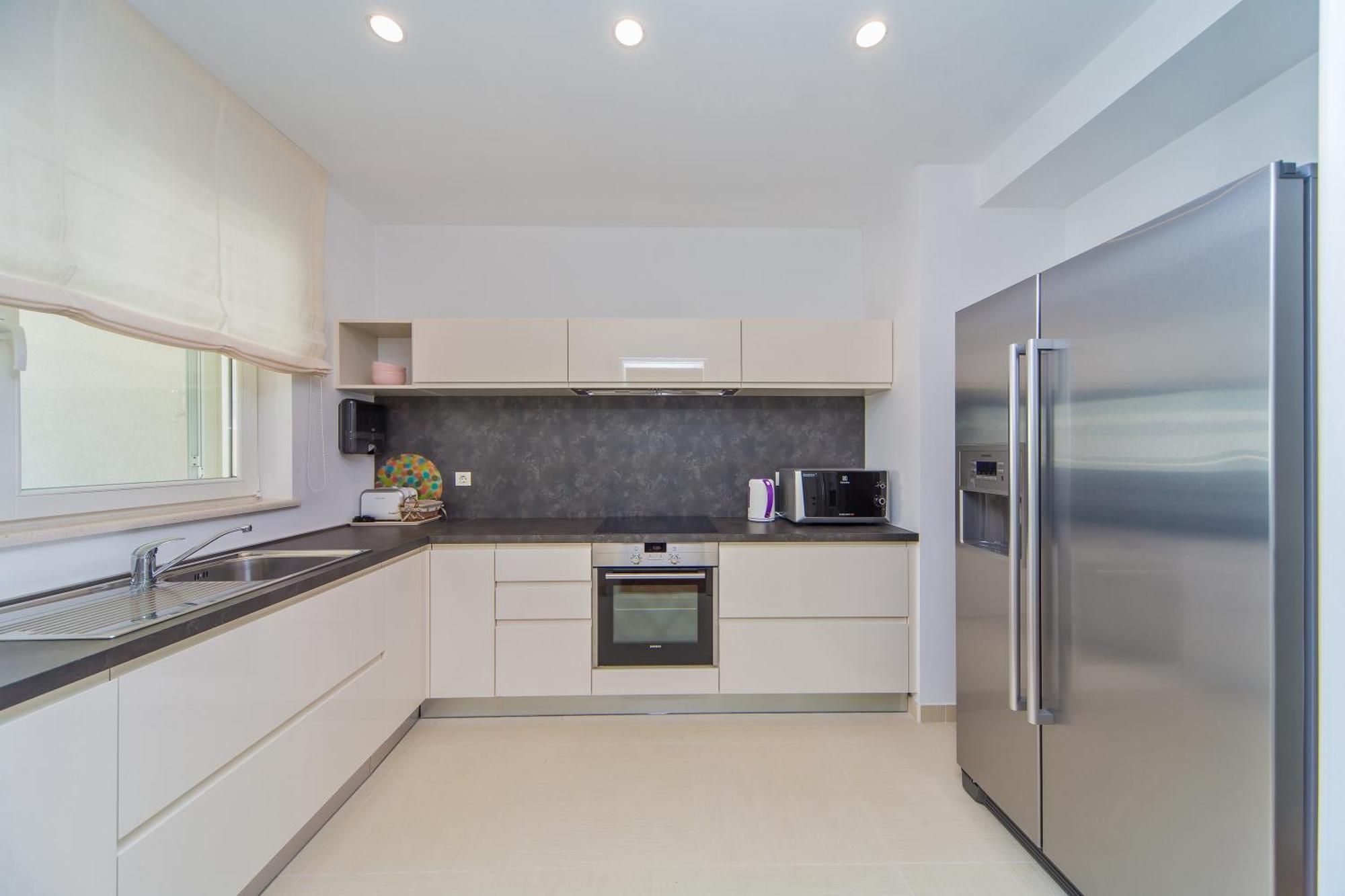 Deluxe Three-Bedroom Apartment Terrace Partial Sea View